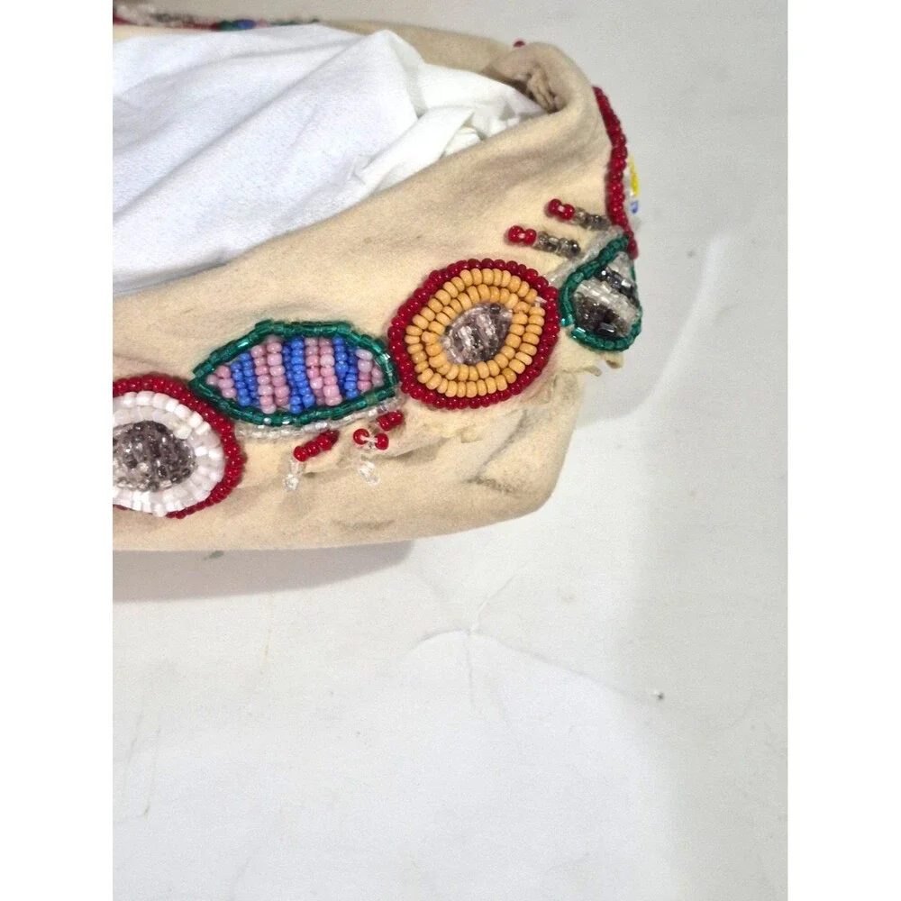 Vintage Crow Beaded Hide Moccasins featuring Intricate Colorful Glass Beadwork